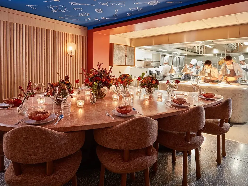 Inside Michelin star restaurant with open plan kitchen