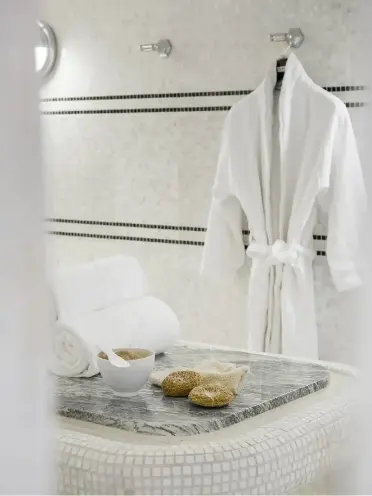 Bathroom with robe hanging on the wall