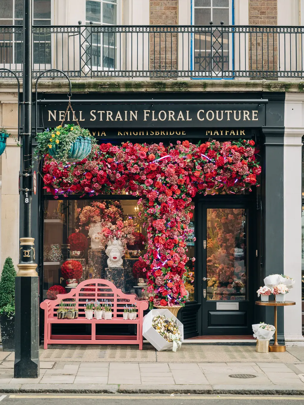 Exterior of the Neill Strain florist with a huge flower display