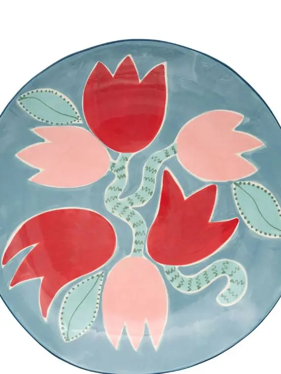 A plate with flowers painted on it